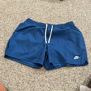 Blue Nike swim trunks